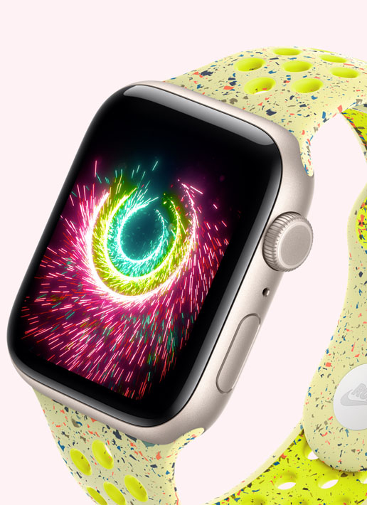 Apple Watch SE 3, aluminum case, starlight colour, Activity rings sparking like fireworks, volt splash Nike Sport Band