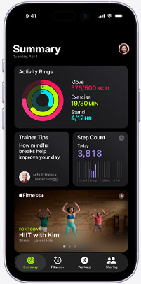 Apple Fitness+ app on an iPhone showing the Summary tab screen, featuring Activity rings, Trainer Tips, Step Count, and recommended Apple Fitness+ workouts