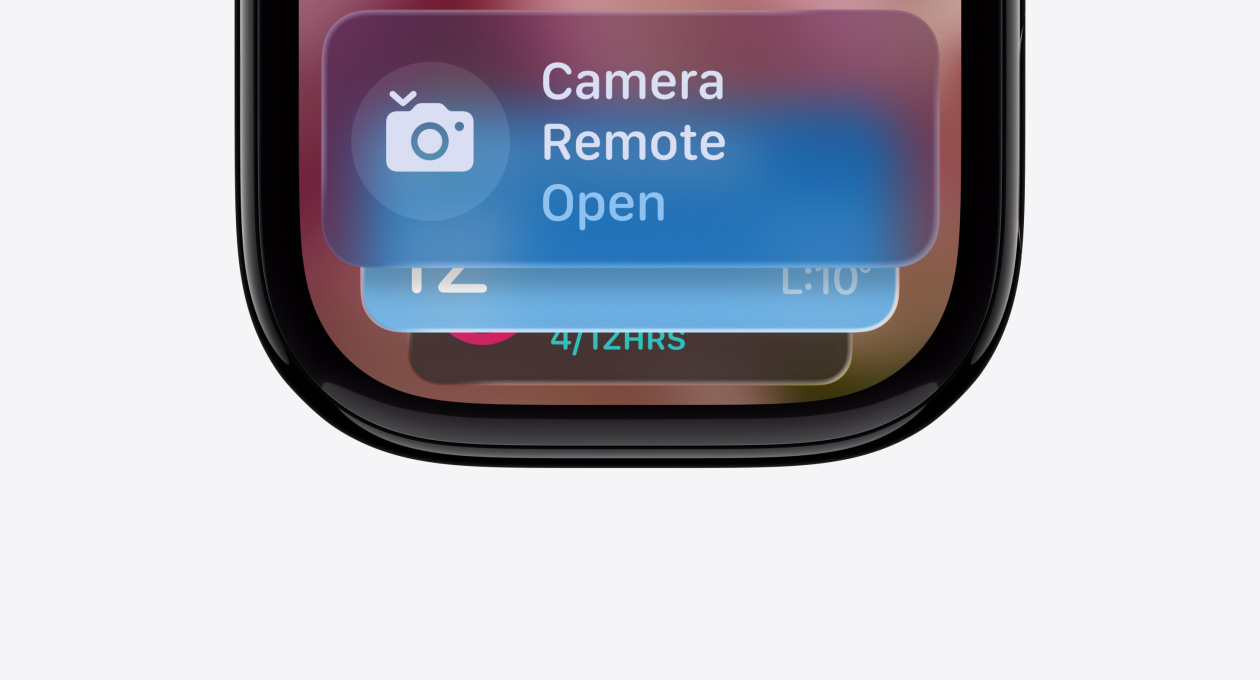 Apple Watch in Jet Black with no band, face shows Smart Stack hint indicator