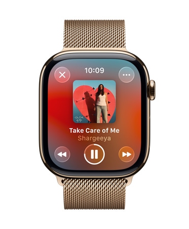Apple Watch in Gold Titanium with Milanese loop band, face shows Apple Music playing, translucent Liquid Glass controls