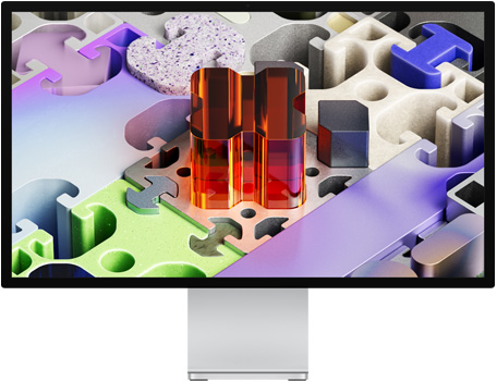 Vue avant du Studio Display XDR affichant un fond d’écran tridimensionnel de type puzzle