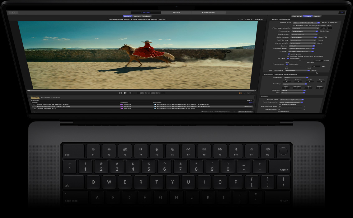 MacBook Pro 16, screen showing Compressor workspace with image of woman in red dress riding a horse, demo of batch export