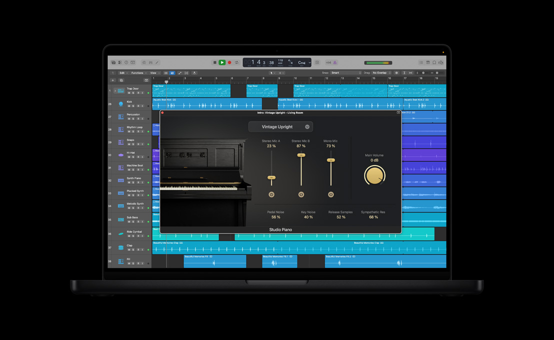 MacBook Pro 16 screen showing Studio Piano, Intro: Vintage Upright - Living Room window with black piano on the left, dials and controls